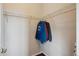 Walk in closet with metal shelving; clothes are hanging on a metal rod at 13275 E Caley Pl, Centennial, CO 80111