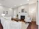 Comfortable living room showcases a fireplace, neutral colors, and ample seating at 13275 E Caley Pl, Centennial, CO 80111