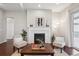 Cozy living room featuring a fireplace, stylish decor, and an inviting atmosphere at 13275 E Caley Pl, Centennial, CO 80111