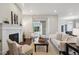 Inviting living room showcases a fireplace, sliding doors to patio, and comfortable seating at 13275 E Caley Pl, Centennial, CO 80111
