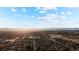 Expansive aerial view of a residential area, highlighting the landscape and natural surroundings at 4510 W 4Th Ave, Denver, CO 80219