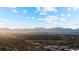 Panoramic aerial view showcasing the mountains, cityscape, and thriving community at 4510 W 4Th Ave, Denver, CO 80219