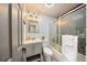 Updated bathroom with subway tile, modern fixtures, and stylish vanity at 4510 W 4Th Ave, Denver, CO 80219