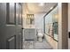 Stylish bathroom with subway tile, patterned flooring, and modern fixtures at 4510 W 4Th Ave, Denver, CO 80219