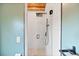 Elegant walk-in shower with rainfall shower head and subway tile, creating a spa-like experience at 4510 W 4Th Ave, Denver, CO 80219
