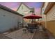 Backyard featuring a patio area and hot tub, creating a perfect space for outdoor gatherings at 3269 Uinta St, Denver, CO 80238