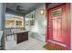 Welcoming front porch with a comfortable seating area and stylish decor elements like a ceiling fan at 3269 Uinta St, Denver, CO 80238