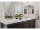 Elegant bathroom with dual vanity, soaking tub, and walk-in shower, perfect for relaxation at 3269 Uinta St, Denver, CO 80238