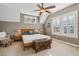 Comfortable main bedroom with a ceiling fan, neutral colors, and bright windows at 3269 Uinta St, Denver, CO 80238