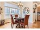 Breakfast nook with hardwood floors and a large window at 9724 Crowsley Ct, Parker, CO 80134
