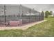 Outdoor tennis court featuring a chain-link fence offers a recreational space for residents and visitors to the community at 9724 Crowsley Ct, Parker, CO 80134