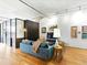 Cozy living room with a comfortable sofa, hardwood floors, and stylish decor at 1499 Blake St # 3U, Denver, CO 80202
