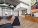 Stylish lobby featuring a reception desk, modern artwork, and comfortable seating, creating a welcoming first impression at 1499 Blake St # 3U, Denver, CO 80202