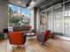 Bright lobby with large windows, modern furniture, and hardwood floors offering a comfortable welcoming space at 1499 Blake St # 3U, Denver, CO 80202