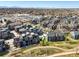 Aerial view showcasing modern townhouse community near parks and open spaces at 5004 S Platte River Pkwy, Littleton, CO 80123
