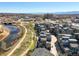 Urban living aerial featuring contemporary townhomes alongside a scenic river walk, perfect for an active lifestyle at 5004 S Platte River Pkwy, Littleton, CO 80123