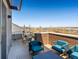 Inviting rooftop deck with comfortable seating and expansive neighborhood views at 5004 S Platte River Pkwy, Littleton, CO 80123