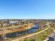 Scenic view of Platte River and walking paths in a vibrant community with clear blue skies at 5004 S Platte River Pkwy, Littleton, CO 80123