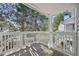 Inviting balcony with wooden floor and white railings, perfect for outdoor enjoyment at 12655 E Pacific Cir # C, Aurora, CO 80014