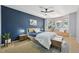 Navy bedroom with bay window, carpet, and ceiling fan at 12655 E Pacific Cir # C, Aurora, CO 80014