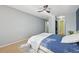 Bedroom with carpet, walk in closet, and ceiling fan at 12655 E Pacific Cir # C, Aurora, CO 80014