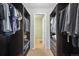 Walk-in closet with shelves and hanger space at 12655 E Pacific Cir # C, Aurora, CO 80014