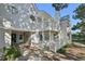 Two-story townhouse featuring a private balcony and white picket fence for added curb appeal at 12655 E Pacific Cir # C, Aurora, CO 80014