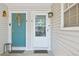Front entrance with wreath and a covered porch at 12655 E Pacific Cir # C, Aurora, CO 80014