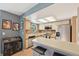 Modern kitchen boasts stainless steel appliances and ample counter space with bar seating at 12655 E Pacific Cir # C, Aurora, CO 80014