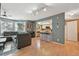 Open living area with views of the kitchen and seamless transitions to other spaces at 12655 E Pacific Cir # C, Aurora, CO 80014
