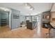 Spacious living area with fireplace, sliding door, and seamless flow to the dining area at 12655 E Pacific Cir # C, Aurora, CO 80014