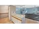 Open-concept living area leads to the kitchen and staircase, creating a cohesive flow at 12655 E Pacific Cir # C, Aurora, CO 80014