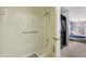 Bright shower stall featuring an adjustable shower head and safety bar at 12655 E Pacific Cir # C, Aurora, CO 80014
