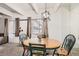 Dining area with a round table and four chairs at 384 S Ironton St # 208, Aurora, CO 80012