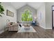 Bright living room with large windows and modern decor at 7119 S Riviera St, Aurora, CO 80016