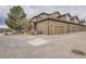 Well-maintained townhome with attached garages and neat landscaping in a desirable community at 6506 Silver Mesa Dr # F, Highlands Ranch, CO 80130