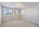 Simple bedroom with neutral walls and carpet flooring at 9656 Browns Peak Cir, Littleton, CO 80125