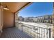 Private deck overlooking community and snow-covered ground at 9656 Browns Peak Cir, Littleton, CO 80125