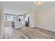 Spacious living room with hardwood floors and an open concept design at 9656 Browns Peak Cir, Littleton, CO 80125