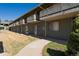 Charming condominium with balconies, green siding and well maintained common outdoor area at 9925 W 20Th Ave # 2, Lakewood, CO 80215