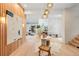 Grand foyer with modern lighting, a decorative accent wall, and an elegant round table at 1001 S Adams St, Denver, CO 80209