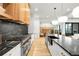 Well appointed kitchen offering marble counters, stainless appliances, and lots of light at 1001 S Adams St, Denver, CO 80209