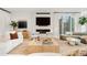 Cozy living space with fireplace, large windows, and comfortable seating at 1001 S Adams St, Denver, CO 80209