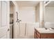 Well-lit bathroom features a walk-in tub and modern fixtures at 4385 S Balsam St # 6-103, Littleton, CO 80123