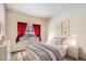 Cozy bedroom featuring a comfortable bed, soft lighting, and stylish decor at 4385 S Balsam St # 6-103, Littleton, CO 80123