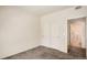 Bedroom features neutral walls, carpet, closet and an entry to the bathroom at 4385 S Balsam St # 6-103, Littleton, CO 80123