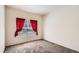 Comfortable bedroom featuring a window with blinds and decorative valance, providing a serene retreat at 4385 S Balsam St # 6-103, Littleton, CO 80123