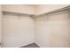 Walk-in closet with shelving and hanging rods, providing ample storage space at 4385 S Balsam St # 6-103, Littleton, CO 80123