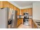Updated kitchen featuring stainless steel appliances and ample cabinet space at 4385 S Balsam St # 6-103, Littleton, CO 80123