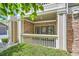 Charming patio with stone accents and white railing at 4385 S Balsam St # 6-103, Littleton, CO 80123
